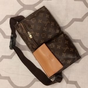 LV fanny pack some imperfections and zipper tab and zipper on back needs repair.